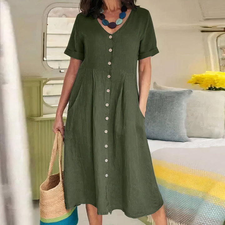 Ester Cotton Midi Dress" can be rephrased as "Ester Midi Dress Made from Cotton.