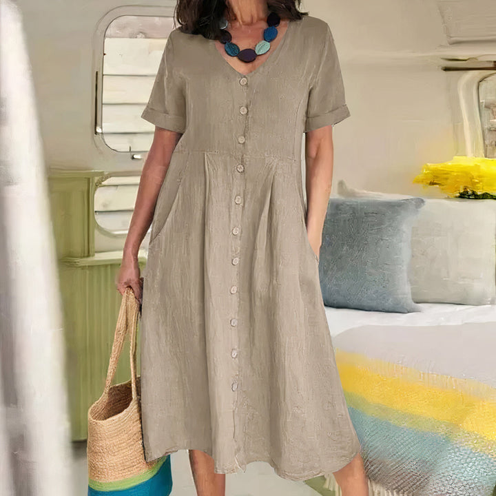 Ester Cotton Midi Dress" can be rephrased as "Ester Midi Dress Made from Cotton.