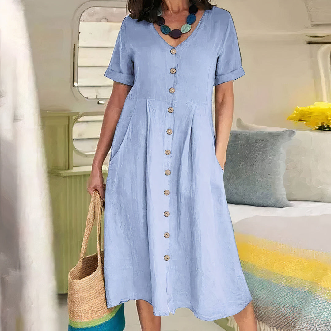 Ester Cotton Midi Dress" can be rephrased as "Ester Midi Dress Made from Cotton.