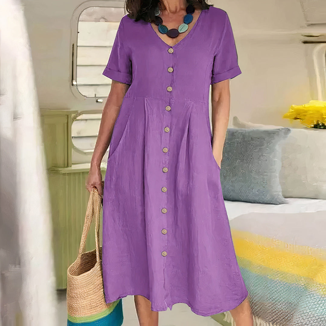 Ester Cotton Midi Dress" can be rephrased as "Ester Midi Dress Made from Cotton.
