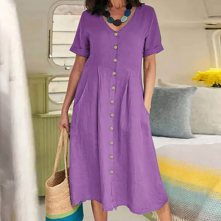 Ester Cotton Midi Dress" can be rephrased as "Ester Midi Dress Made from Cotton.