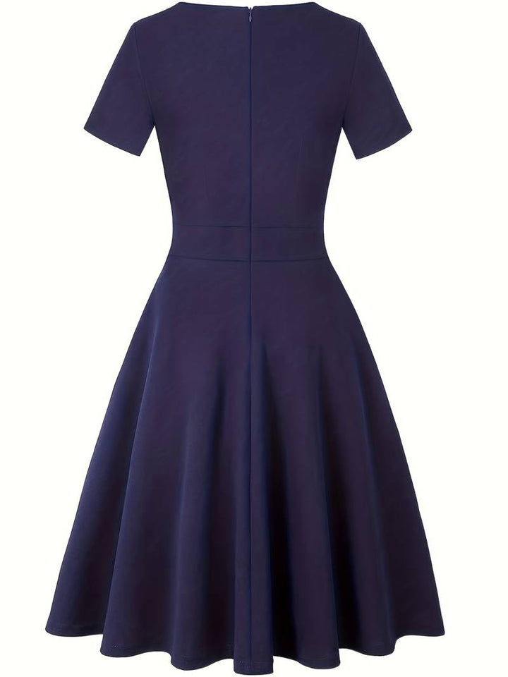 Elegant Blue Dress with Lace Details and Tailored Waist